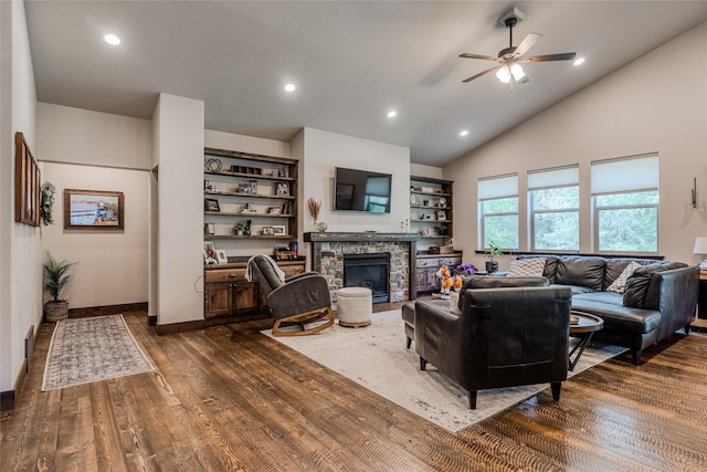 224 Forest Edge Trl, Kalispell, MT 59901 - living room featuring a ceiling fan, dark wood-style flooring, a fireplace, recessed lighting, and high vaulted ceiling