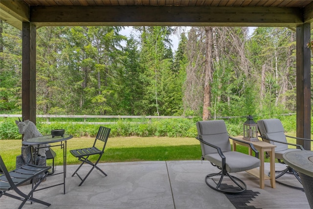 224 Forest Edge Trl, Kalispell, MT 59901 - view of patio with a wooded view