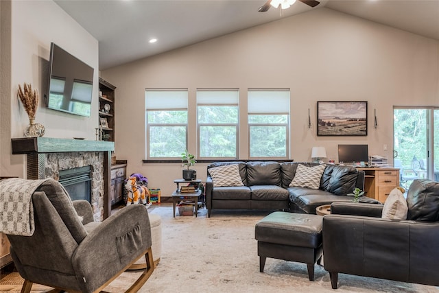 224 Forest Edge Trl, Kalispell, MT 59901 - living area with a fireplace, a ceiling fan, recessed lighting, and high vaulted ceiling