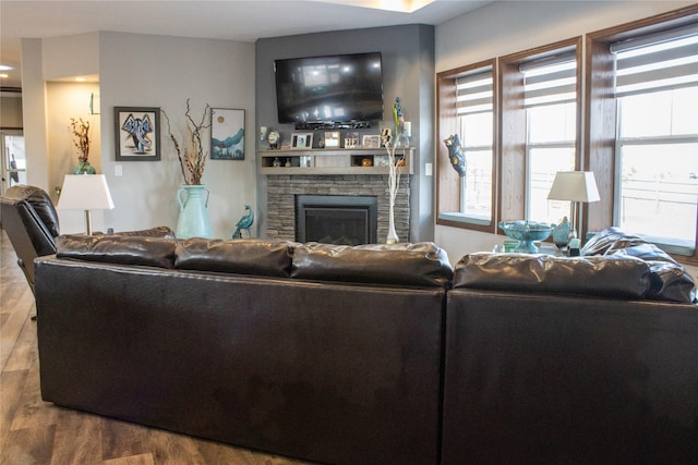 7220 2nd St NW, Havre, MT 59501 - living area with wood finished floors and a fireplace