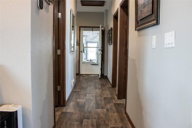 7220 2nd St NW, Havre, MT 59501 - hall with dark wood-style floors and baseboards