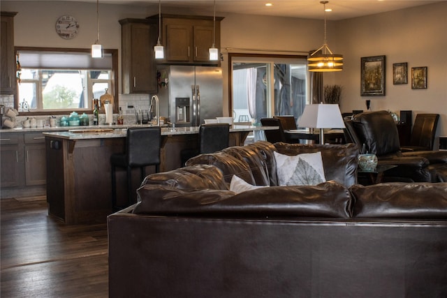 7220 2nd St NW, Havre, MT 59501 - living area with dark wood-style floors and recessed lighting