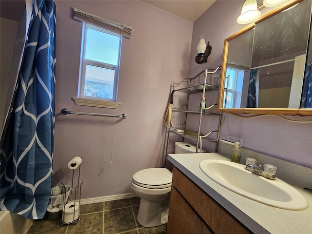 548 N Daly Ave, Hamilton, MT 59840 - full bath with vanity, curtained shower, and tile patterned floors