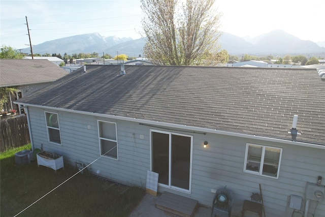 548 N Daly Ave, Hamilton, MT 59840 - rear view of property featuring a mountain view and roof with shingles