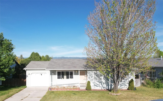 548 N Daly Ave, Hamilton, MT 59840 - ranch-style home featuring a garage, driveway, and roof with shingles