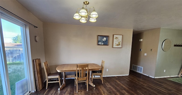548 N Daly Ave, Hamilton, MT 59840 - dining area with wood finished floors and a chandelier
