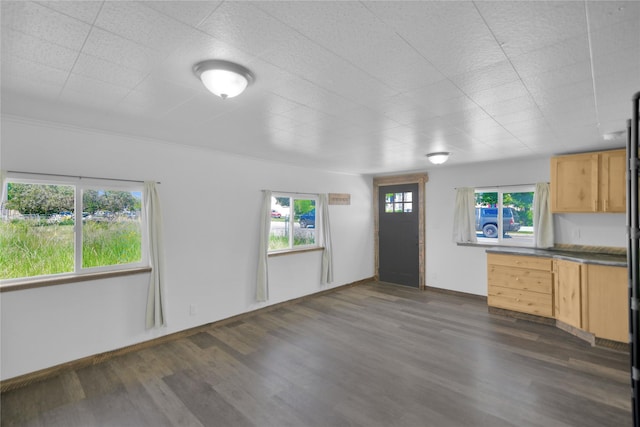 2133 W Sussex Ave, Missoula, MT 59801 - unfurnished living room with dark wood finished floors and baseboards