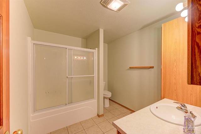 854 State Highway 282, Clancy, MT 59634 - full bath featuring tile patterned floors, vanity, combined bath / shower with glass door, and a textured ceiling