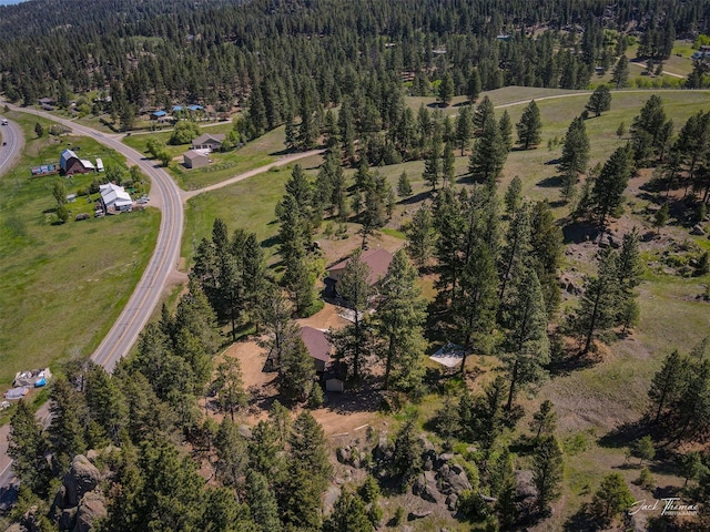 854 State Highway 282, Clancy, MT 59634 - aerial view of property's location with a heavily wooded area
