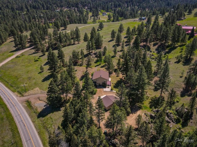 854 State Highway 282, Clancy, MT 59634 - aerial overview of property's location with a forest