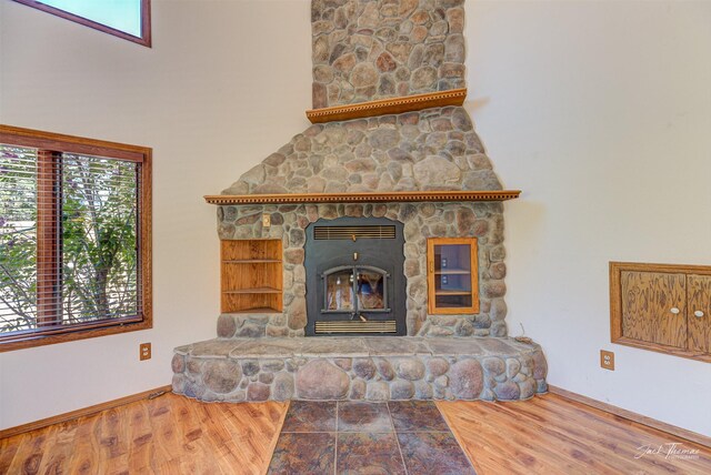 854 State Highway 282, Clancy, MT 59634 - detailed view of wood finished floors and a stone fireplace
