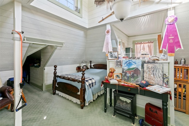 1003 N Burnt Fork Rd, Stevensville, MT 59870 - carpeted bedroom with wood walls