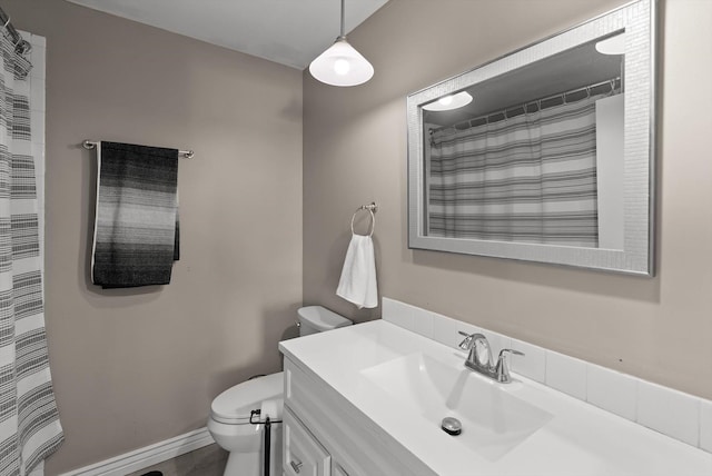 3165 Lamoreux Ln, Missoula, MT 59803 - full bathroom with toilet, vanity, and baseboards