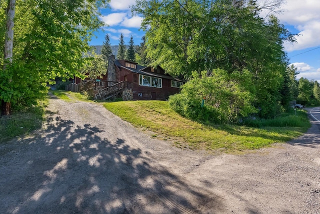 24194 Mt Highway 35, Bigfork, MT 59911 - view of front of home with driveway