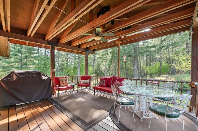 176 Blaine Ridge Rd, Kalispell, MT 59901 - wooden terrace featuring area for grilling, outdoor dining space, and a ceiling fan