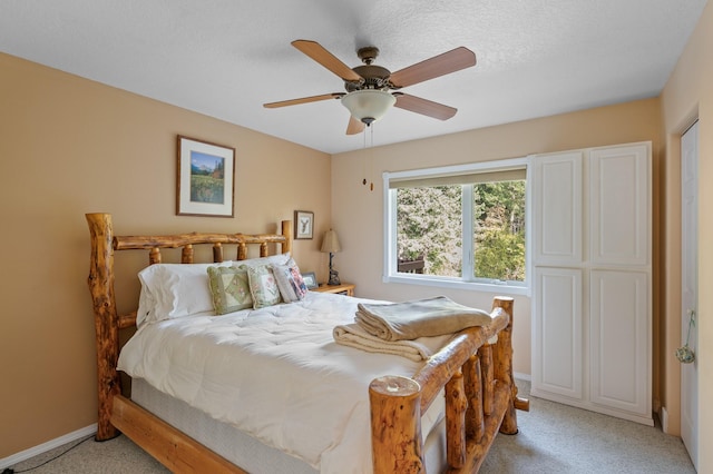 176 Blaine Ridge Rd, Kalispell, MT 59901 - bedroom featuring light carpet and ceiling fan