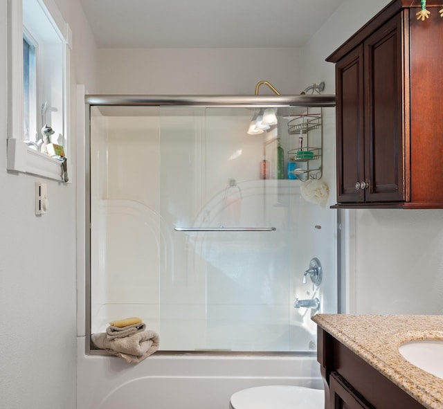 176 Blaine Ridge Rd, Kalispell, MT 59901 - full bathroom featuring vanity and shower / bath combination with glass door
