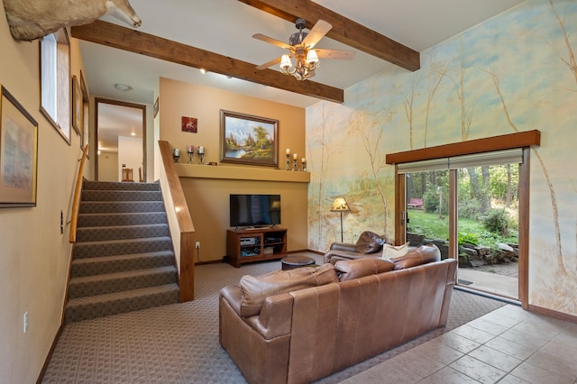 176 Blaine Ridge Rd, Kalispell, MT 59901 - living area featuring stairs, beam ceiling, and ceiling fan