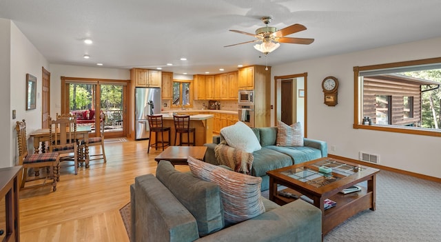 176 Blaine Ridge Rd, Kalispell, MT 59901 - living room featuring a ceiling fan, recessed lighting, and light wood-style floors