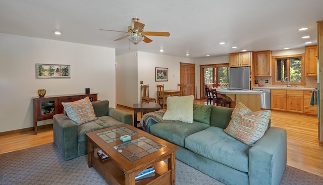 176 Blaine Ridge Rd, Kalispell, MT 59901 - living room featuring recessed lighting, a ceiling fan, and light wood-style flooring
