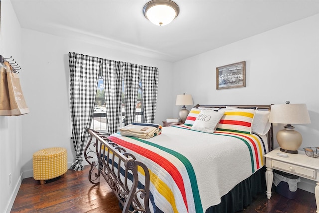 537 Rainbow Ridge Trl, Columbia Falls, MT 59912 - bedroom featuring wood finished floors and baseboards
