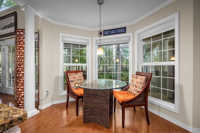 3 Bearberry Ln, Whitefish, MT 59937 - dining area with wood finished floors, ornate columns, and ornamental molding