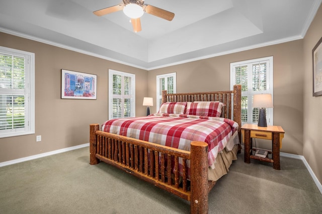 3 Bearberry Ln, Whitefish, MT 59937 - carpeted bedroom featuring a raised ceiling, multiple windows, and crown molding