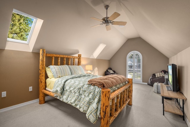 3 Bearberry Ln, Whitefish, MT 59937 - bedroom featuring carpet floors, a skylight, vaulted ceiling, and a ceiling fan