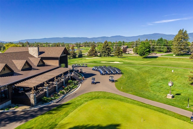 267 Eagle Bend Dr, Bigfork, MT 59911 - drone / aerial view of a mountain backdrop and a golf course