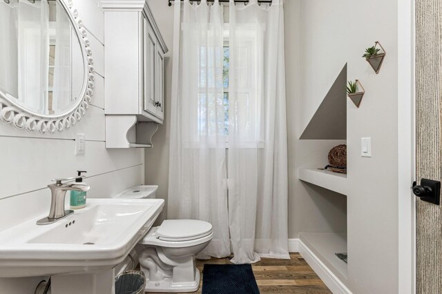 33 Shale Ct, Kalispell, MT 59901 - bathroom with wood finished floors and a shower with curtain