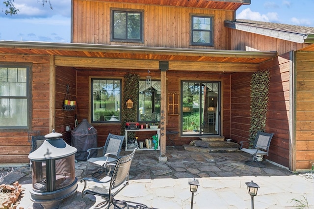 33 Shale Ct, Kalispell, MT 59901 - back of house featuring entry steps and a patio