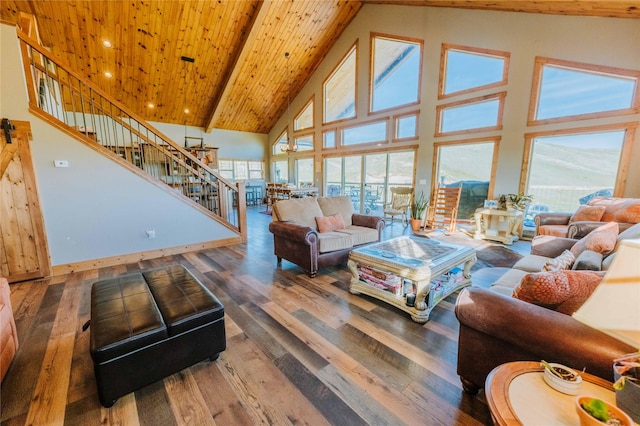 7 Papson Ridge Ln, Hall, MT 59837 - living room with high vaulted ceiling, stairway, wood finished floors, and a wood ceiling with exposed beams