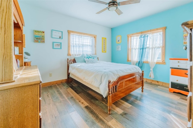 7 Papson Ridge Ln, Hall, MT 59837 - bedroom featuring wood finished floors and ceiling fan