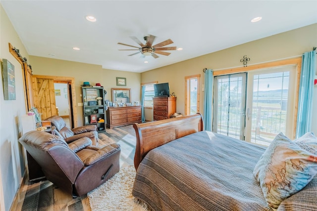7 Papson Ridge Ln, Hall, MT 59837 - bedroom featuring wood finished floors, access to outside, recessed lighting, and ceiling fan