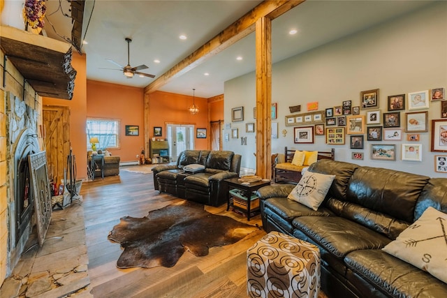 7 Papson Ridge Ln, Hall, MT 59837 - living area featuring a ceiling fan, wood finished floors, recessed lighting, and a baseboard radiator
