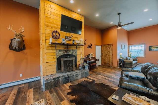 7 Papson Ridge Ln, Hall, MT 59837 - living area with ceiling fan, wood finished floors, a fireplace, recessed lighting, and baseboard heating