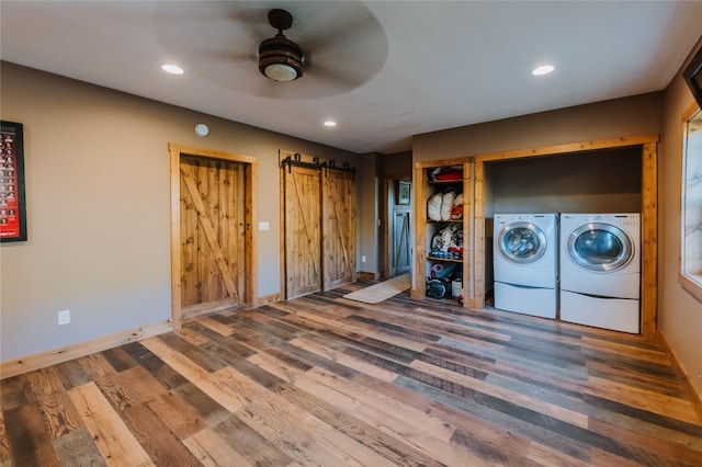7 Papson Ridge Ln, Hall, MT 59837 - washroom with washing machine and dryer, a barn door, wood finished floors, a ceiling fan, and recessed lighting