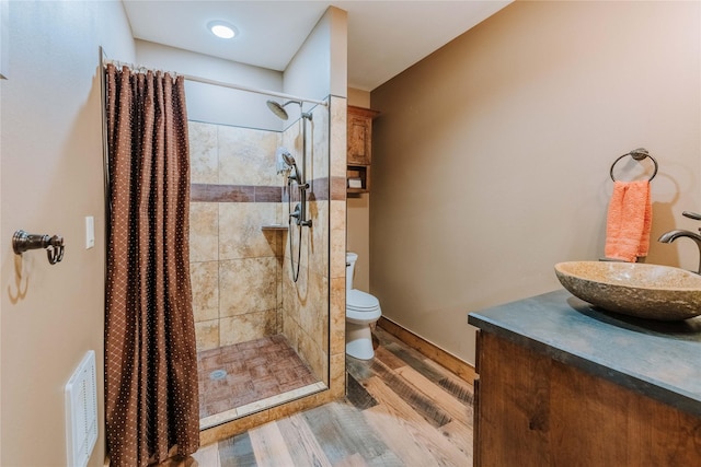 7 Papson Ridge Ln, Hall, MT 59837 - bathroom with wood finished floors, a shower stall, and vanity