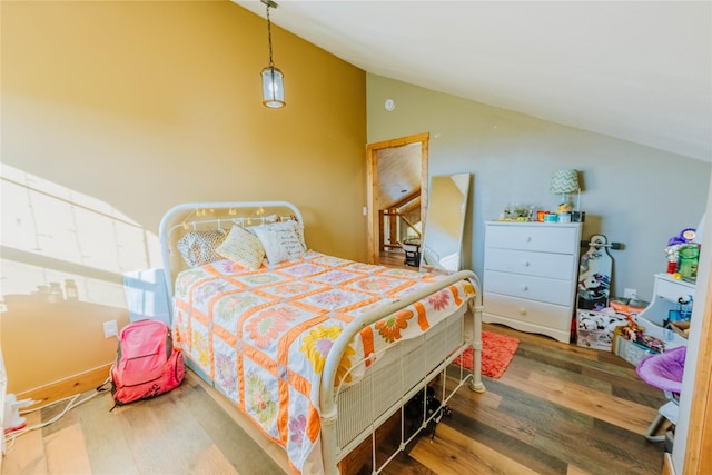 7 Papson Ridge Ln, Hall, MT 59837 - bedroom with vaulted ceiling and wood finished floors
