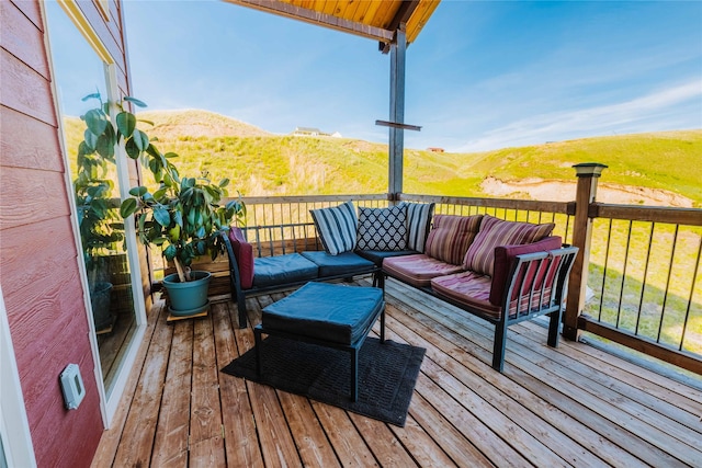 7 Papson Ridge Ln, Hall, MT 59837 - deck featuring a mountain view and an outdoor living space