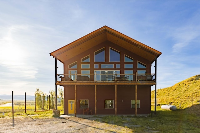 7 Papson Ridge Ln, Hall, MT 59837 - back of property featuring a mountain view and a balcony
