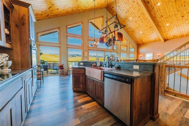 7 Papson Ridge Ln, Hall, MT 59837 - kitchen with dishwasher, dark countertops, high vaulted ceiling, dark wood-type flooring, and a wooden ceiling with exposed beams