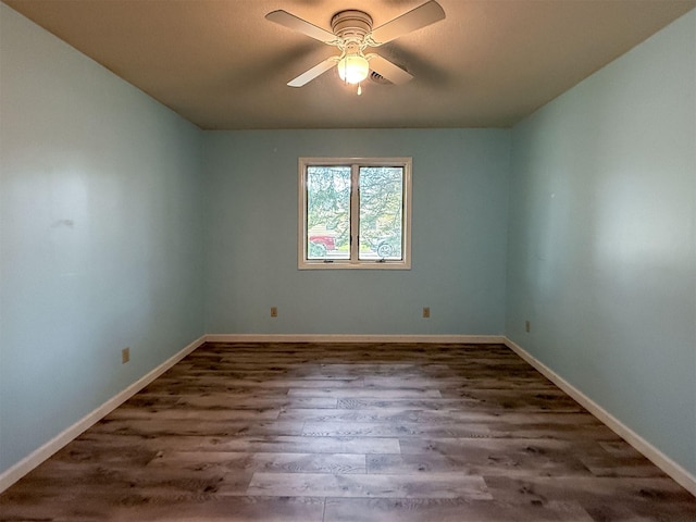 802 2nd St SW, Choteau, MT 59422 - unfurnished room with wood finished floors, a ceiling fan, and baseboards