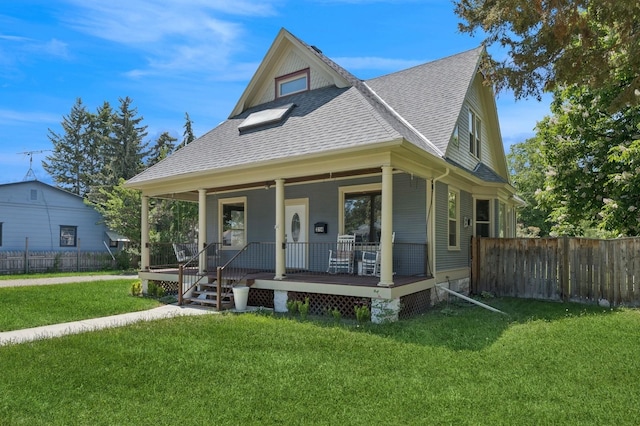 314 9th Ave W, Kalispell, MT 59901 - view of front of home featuring a shingled roof and covered porch