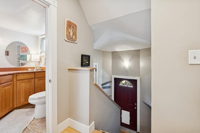 314 9th Ave W, Kalispell, MT 59901 - foyer with baseboards and light tile patterned floors