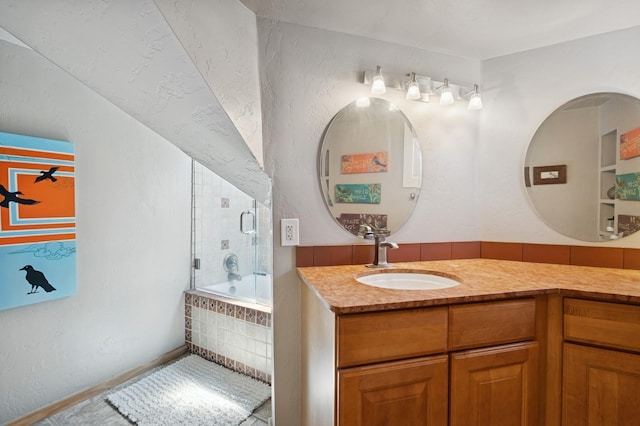 314 9th Ave W, Kalispell, MT 59901 - full bathroom featuring vanity and tiled shower / bath combo