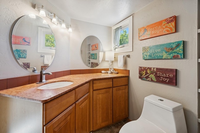314 9th Ave W, Kalispell, MT 59901 - bathroom featuring toilet and vanity