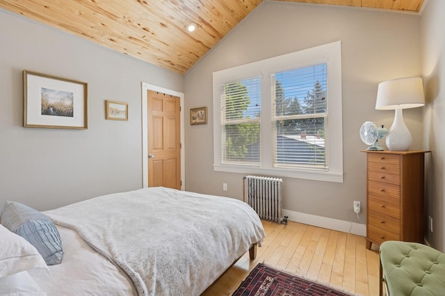 314 9th Ave W, Kalispell, MT 59901 - bedroom featuring radiator, wood ceiling, wood-type flooring, lofted ceiling, and baseboards