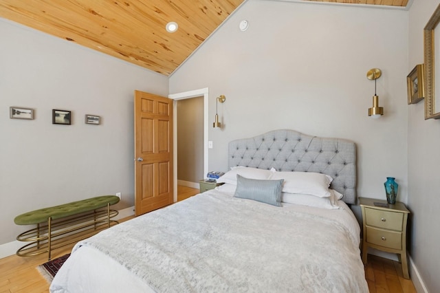 314 9th Ave W, Kalispell, MT 59901 - bedroom featuring lofted ceiling, wood ceiling, wood finished floors, and baseboards