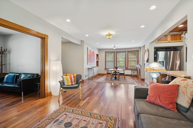 314 9th Ave W, Kalispell, MT 59901 - living room featuring wood finished floors, recessed lighting, and baseboards
